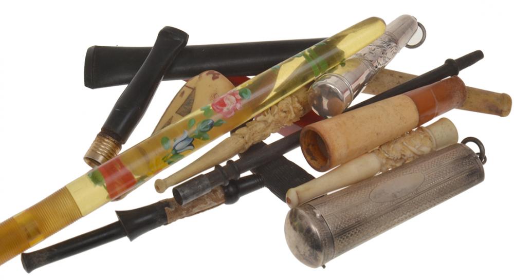 Appraisal: COLLECTION OF CIGARETTE HOLDERS PIPES ALL FAULTS