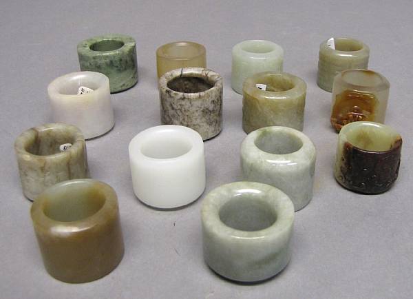 Appraisal: A group of fourteen archer's rings Variously carved from nephrite