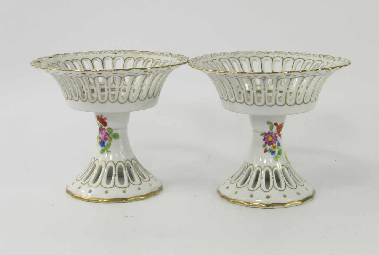 Appraisal: A pair of Continental porcelain pedestal sweetmeat dishes with pierced