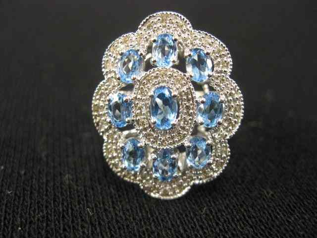 Appraisal: Blue Topaz Diamond Ring rich ovalgems surrounded by diamonds in