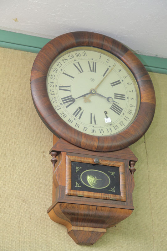 Appraisal: ANSONIA WALL CLOCK Eight day time strike with painted tin