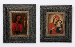 Appraisal: Russian icons in black frames Pair of Russian icons late