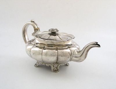 Appraisal: A George IV silver teapot od lobed circular form flush