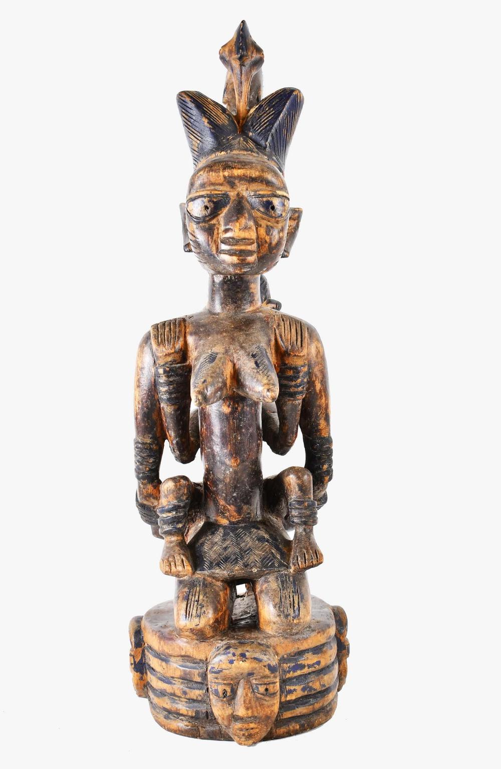 Appraisal: SENUFU CARVED WOOD MOTHER AND CHILDThe bare breasted mother with