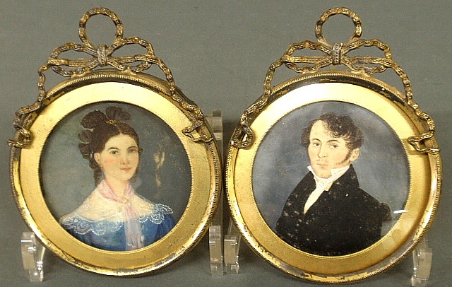 Appraisal: - Pair of miniature portraits watercolor on heavy paper possibly