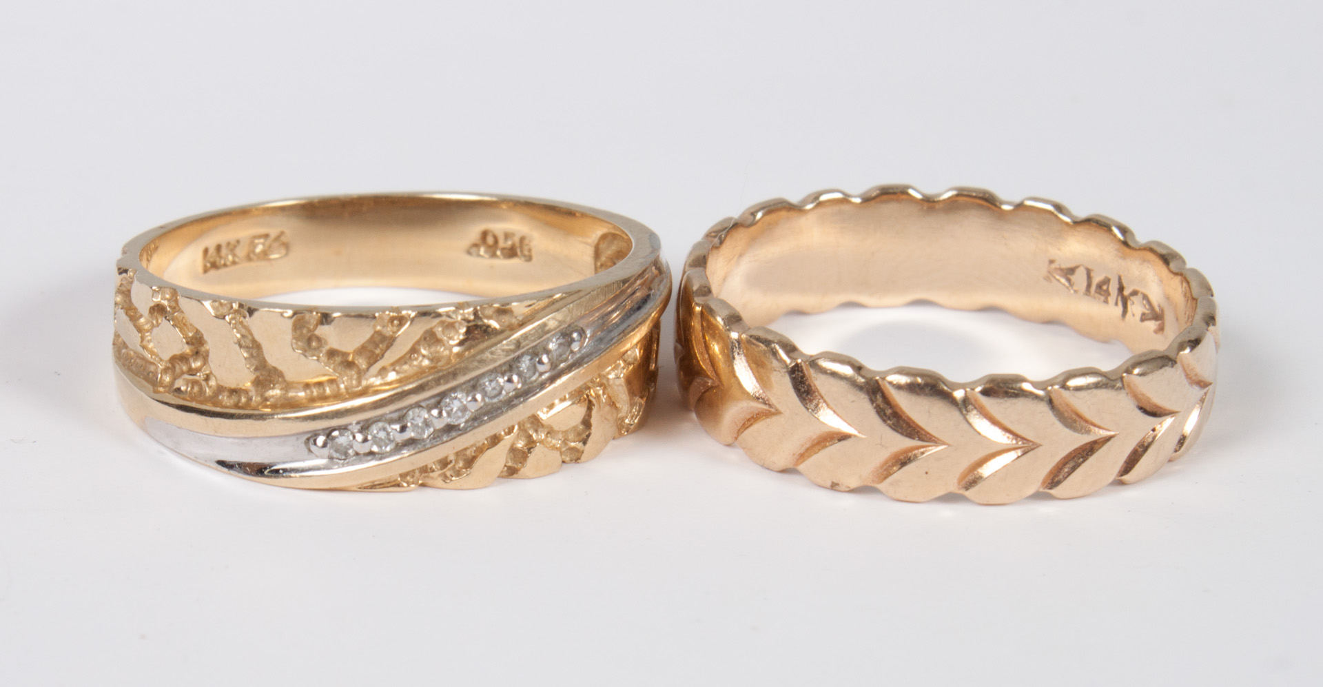 Appraisal: Two gentleman's K gold ring bands sizes grams