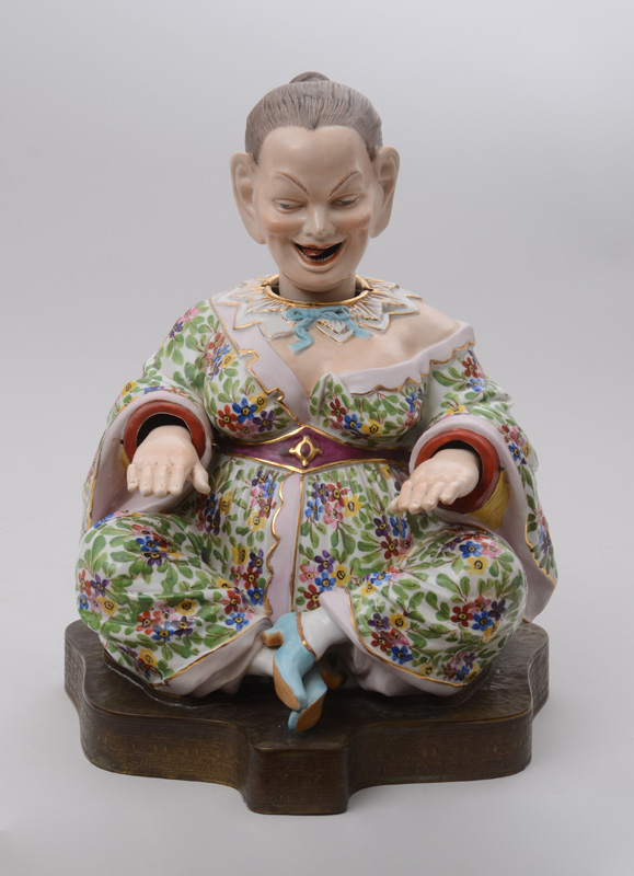 Appraisal: MEISSEN STYLE PORCELAIN CHINOISERIE NODDING HEAD FIGURE Modeled as a