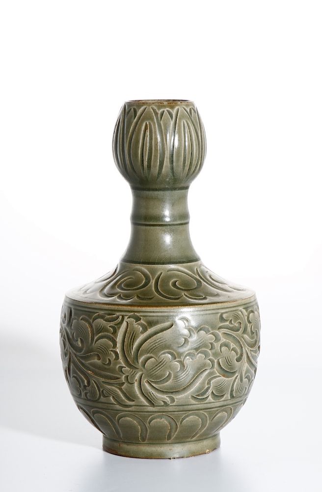 Appraisal: Chinese Yaozhou Carved Garlic-Mouth Vase Of rounded body with a