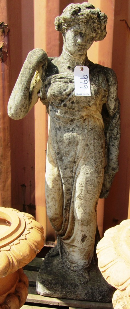 Appraisal: A reconstituted stone figure of a semi robed classical lady