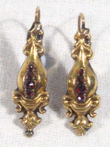 Appraisal: A pair of Victorian garnet set earrings circa