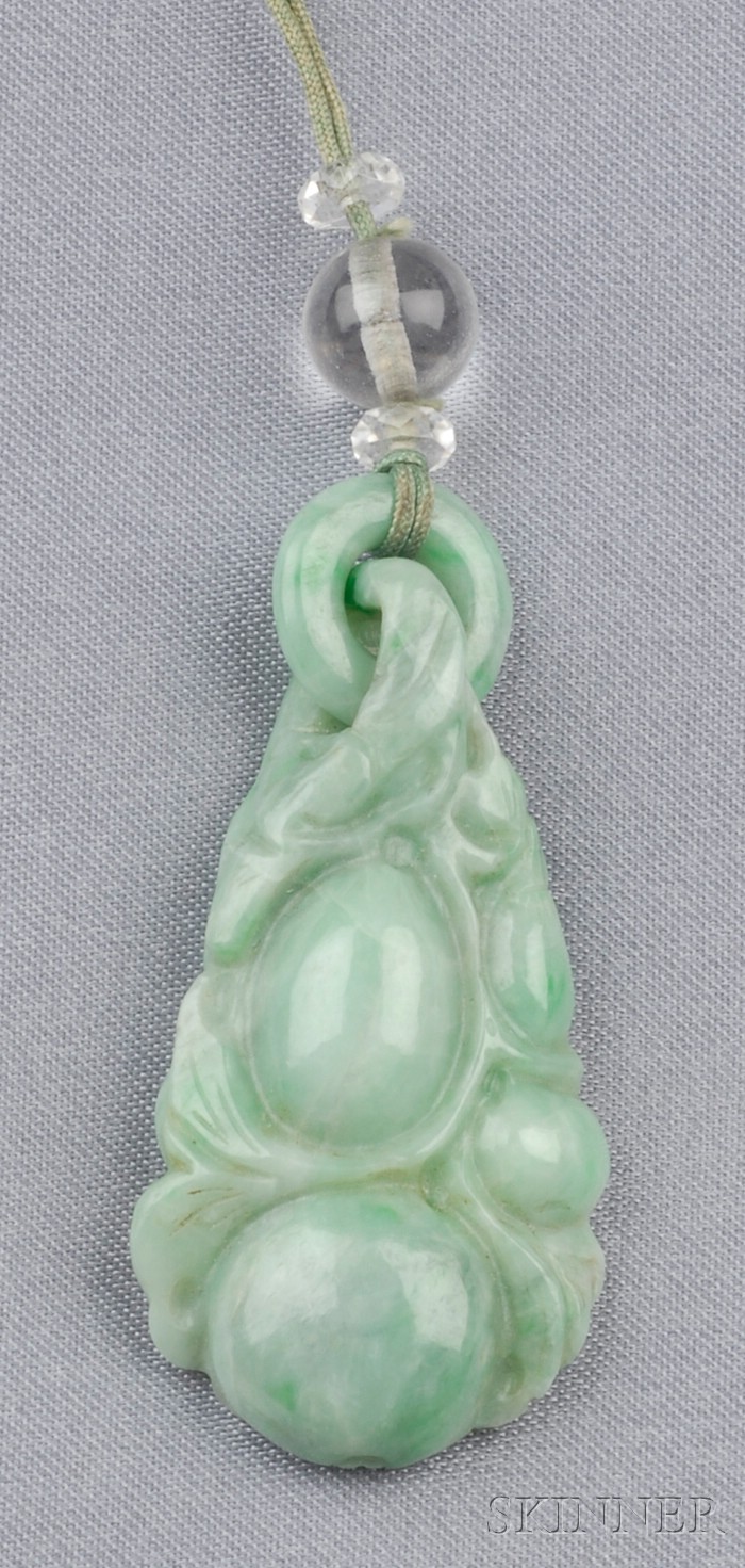 Appraisal: Jade and Rock Crystal Pendant the pendant carved to depict