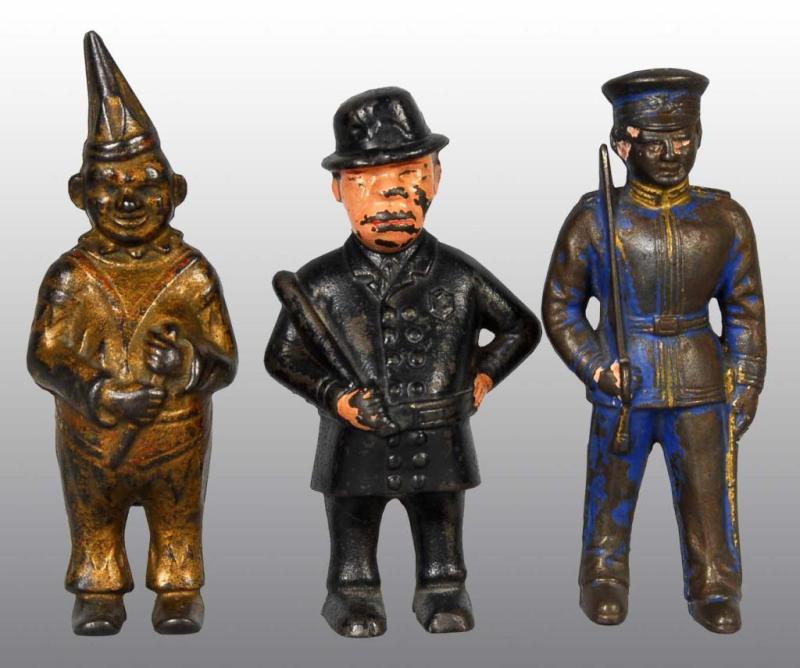 Appraisal: Lot of Cast Iron Still Banks Description Includes policeman clown