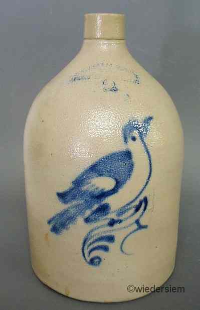 Appraisal: Two-gallon stoneware jug with blue decorated bird ''h