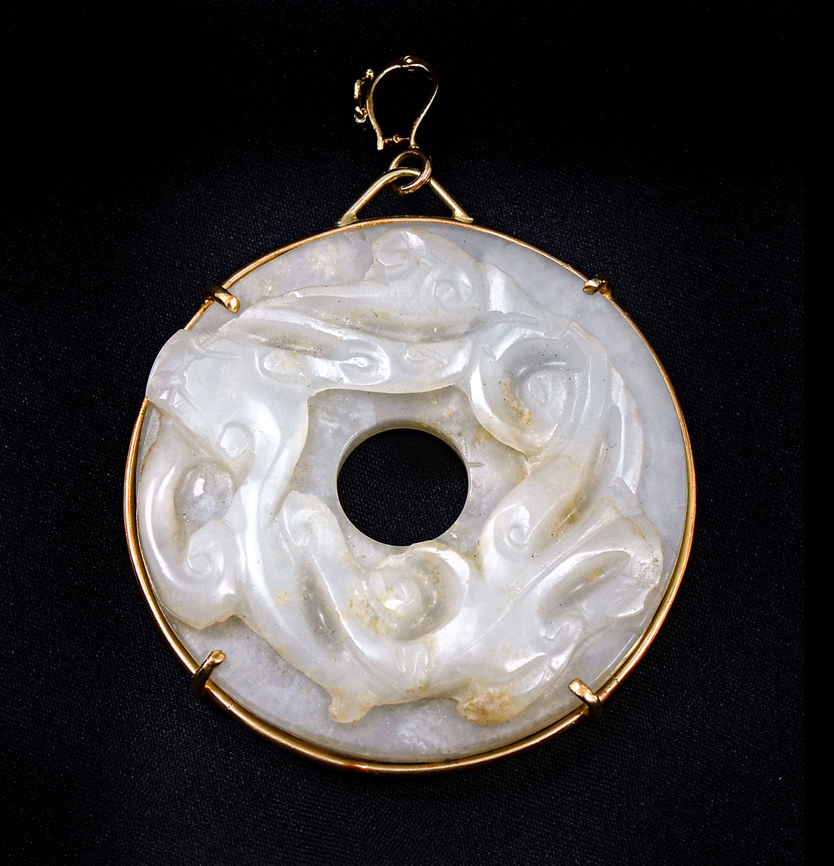 Appraisal: MUTTON FAT JADE HYDRA MOTIF PENDANT IN K Certified th