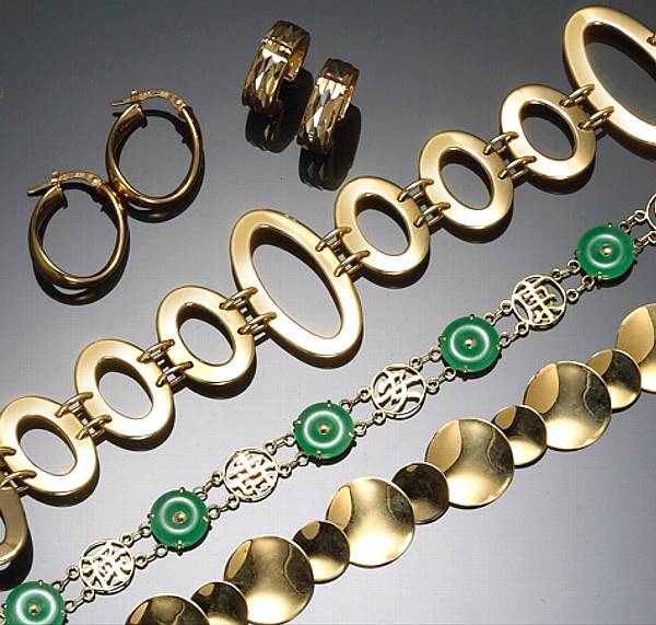 Appraisal: A collection of jade and k gold jewelry comprising bracelets