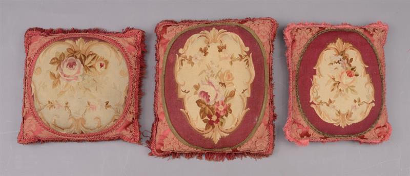 Appraisal: THREE AUBUSSON TAPESTRY-MOUNTED PILLOWS Richly worked with floral bursts on