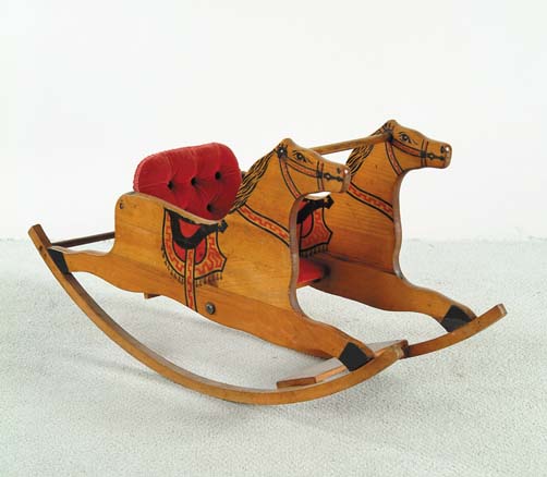 Appraisal: PAINTED AND CARVED HORSE ROCKING CHAIR Horse silhouette sides with