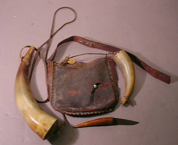 Appraisal: An American hunting pouch with powder and priming horns th