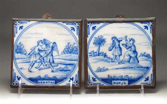 Appraisal: Pair of Dutch delft blue and white religious scenic decorated