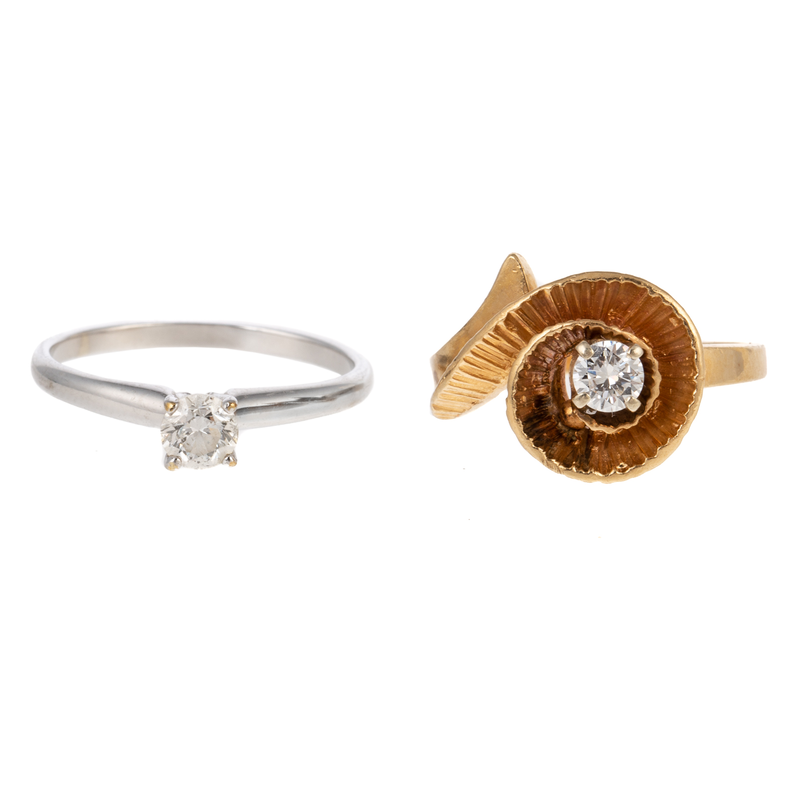 Appraisal: A PAIR OF DIAMOND SOLITAIRE RINGS IN K K yellow