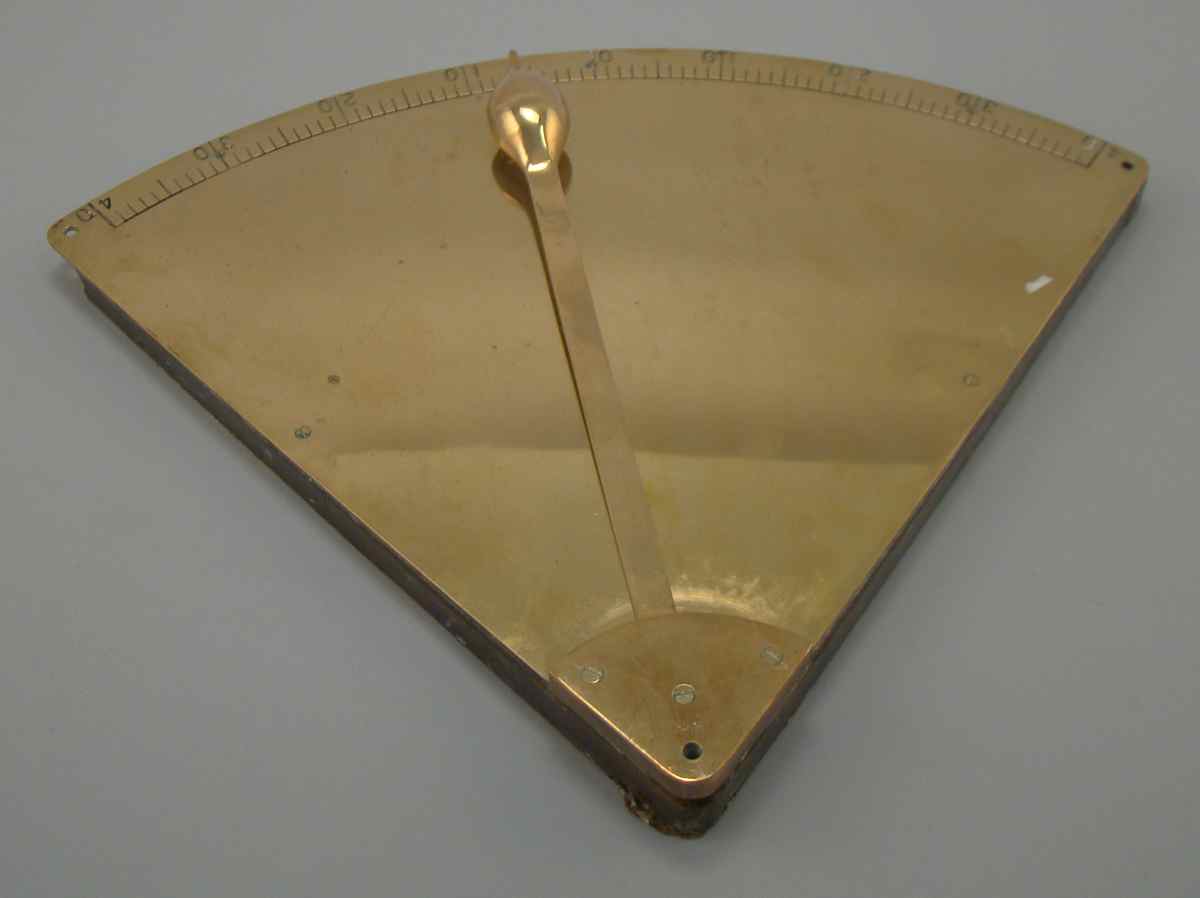 Appraisal: BRASS CLINOMETER Mounted to a wood backboard Scale is marked