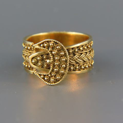 Appraisal: k Gold Buckle Ring fancy braided studded design yellow gold