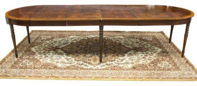 Appraisal: Figured wood extension table th c banded tabletop extends with