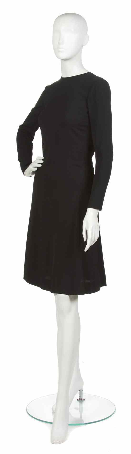 Appraisal: An Yves Saint Laurent Couture Black Silk Crepe Dress raglan