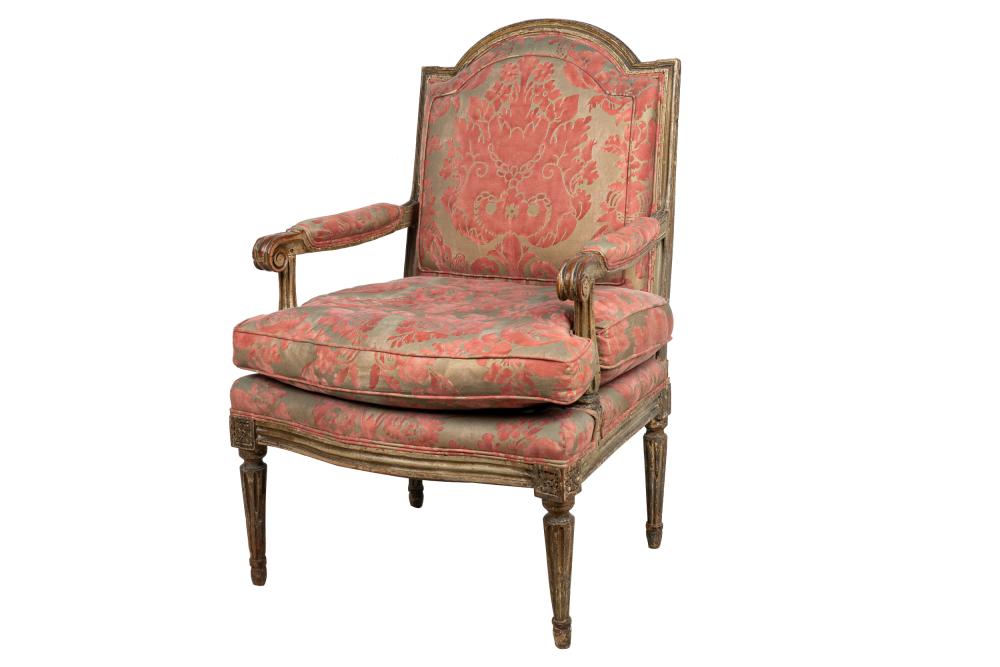 Appraisal: LOUIS XVI CARVED PAINTED FAUTEUILwith red and grey Fortuny upholstery