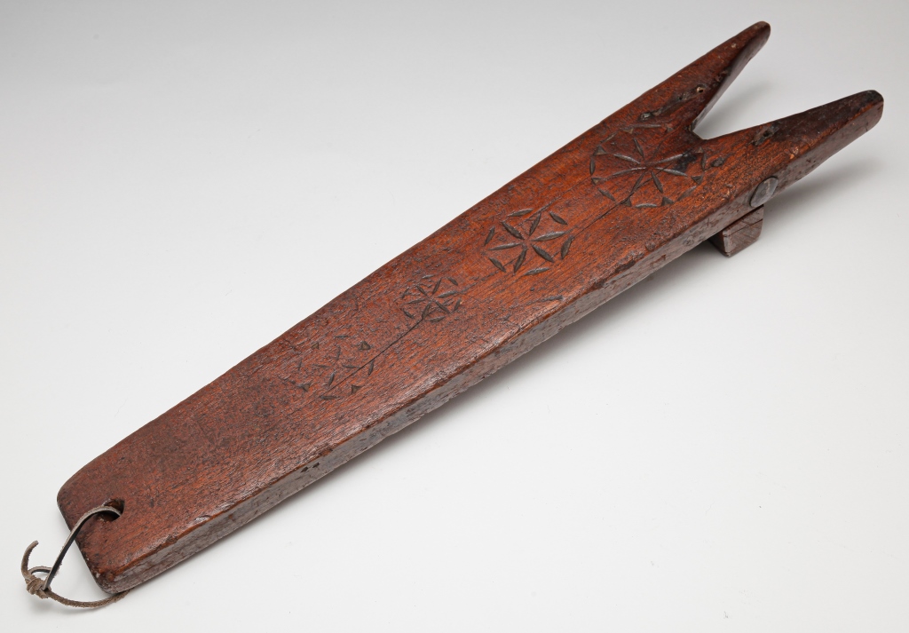 Appraisal: AMERICAN BOOTJACK Dated cherry Carved compass stars and date with