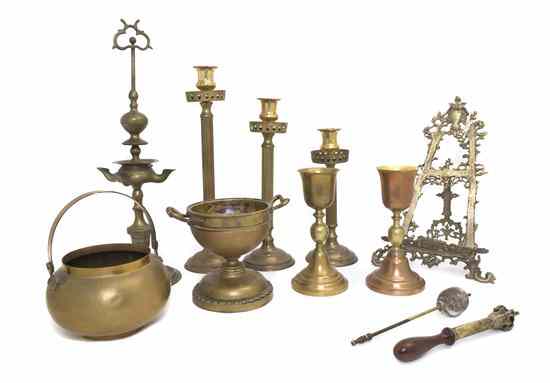 Appraisal: A Collection of Brass Articles comprising candlesticks goblets an easel