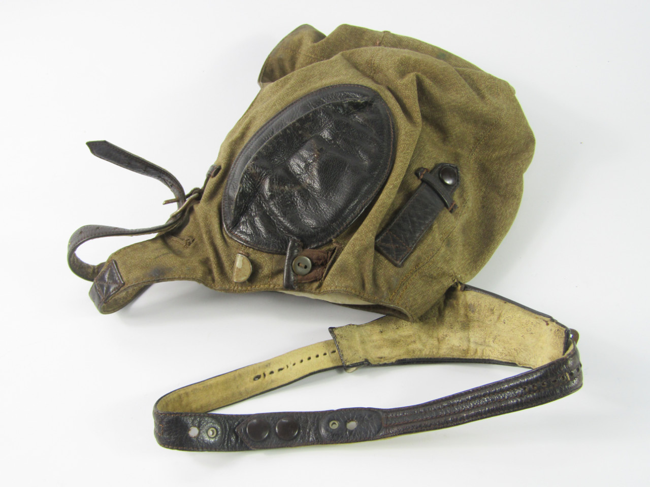 Appraisal: A Third Reich Luftwaffe airman's fabric and leather head protector