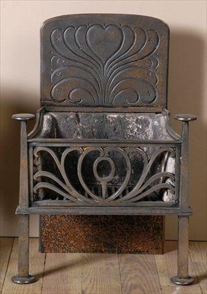 Appraisal: AESTHETIC CAST IRON FIREGRATE x x in Christie's lot This