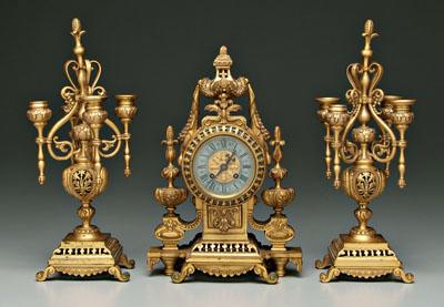 Appraisal: Bronze dor eacute Tiffany clock garniture floral swags above clock