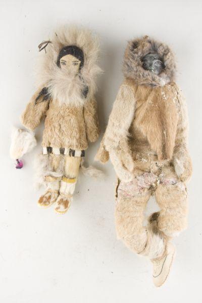 Appraisal: Vintage Inuit Dolls male and female both wearing hide parkas