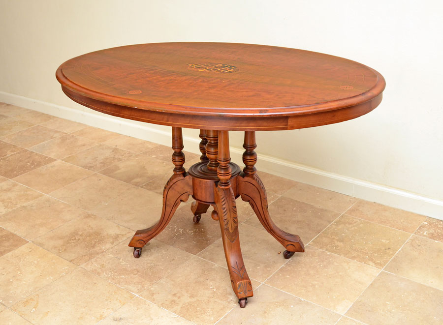 Appraisal: INLAID OVAL HALL TABLE Floral marquetry center medallion string inlay