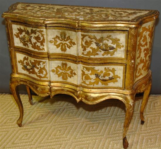 Appraisal: FLORENTINE COMMODE Serpentine form gilt cream original color drawers on