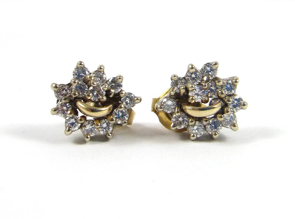 Appraisal: PAIR OF DIAMOND AND FOURTEEN KARAT GOLD EARRINGS each k