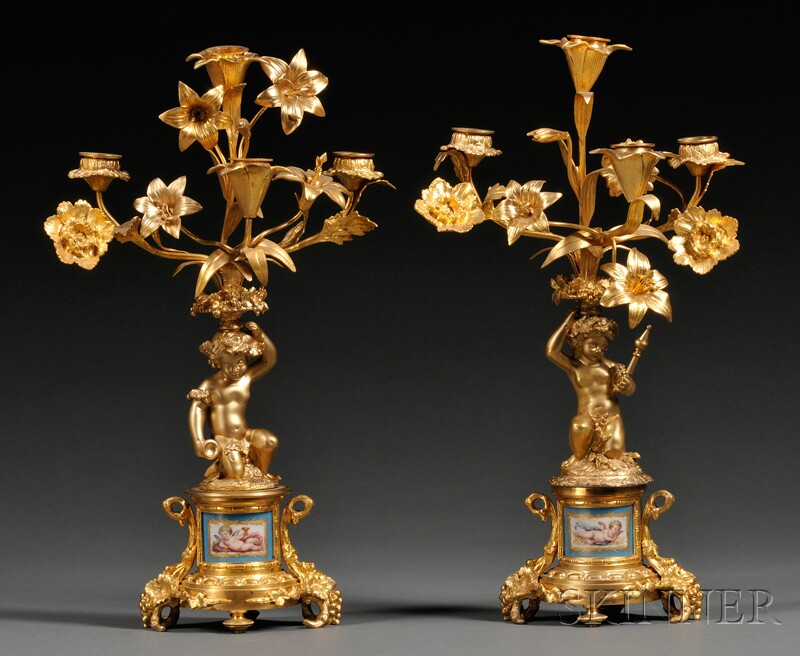 Appraisal: Pair of Sevres-style Porcelain Mounted Dore Bronze Candelabra France early