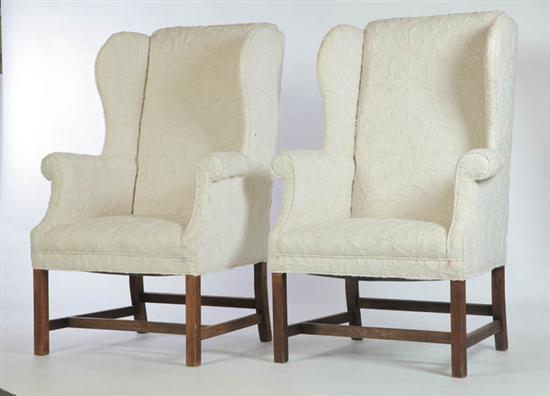 Appraisal: PAIR OF CHIPPENDALE-STYLE WINGBACK ARMCHAIRS Twentieth century mahogany Straight legs