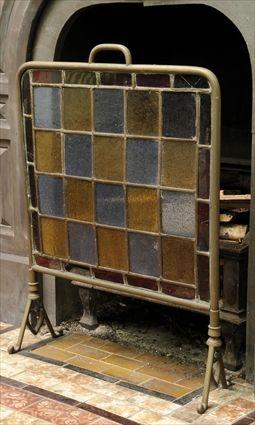 Appraisal: AESTHETIC MOVEMENT BRASS AND STAINED GLASS FIRESCREEN The rectangular frame