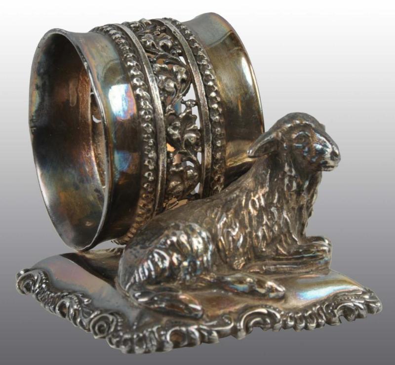 Appraisal: Sitting Lamb Figural Napkin Ring Description Meriden Condition Excellent