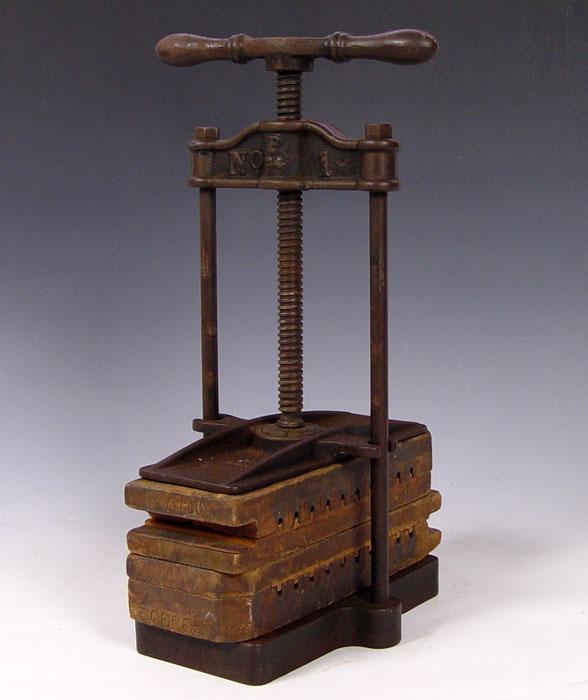 Appraisal: MILLER DUBRUL PETERS CIGAR PRESS WITH MOLDS Early th century