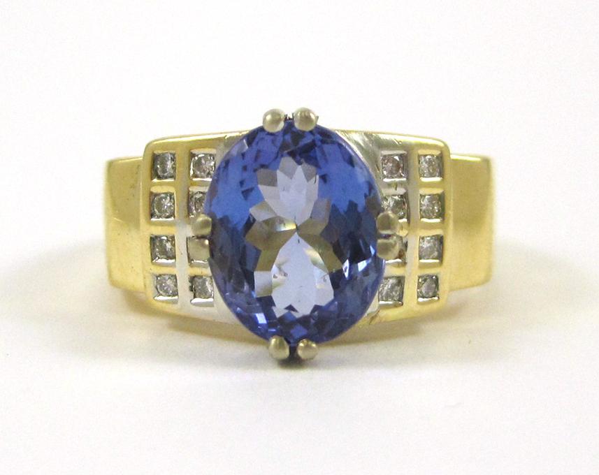 Appraisal: TANZANITE DIAMOND AND EIGHTEEN KARAT GOLD RING with eight round-cut