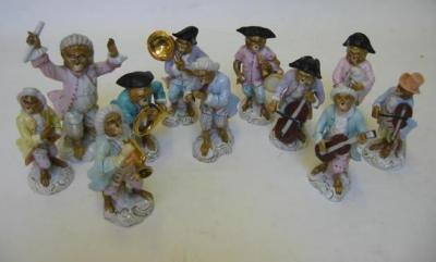 Appraisal: A RUDOLSTADT PORCELAIN MONKEY BAND comprising eleven figures including a