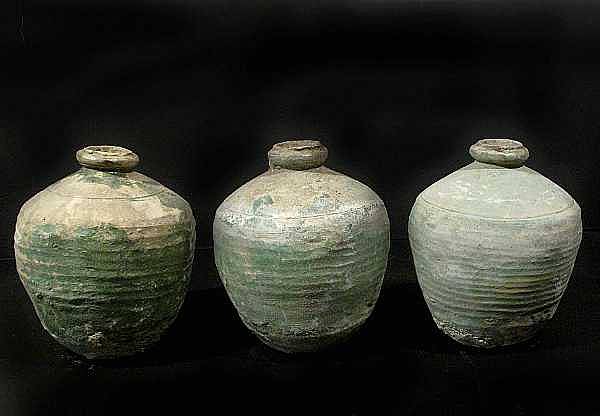 Appraisal: A group of fifteen small terracotta jars gourd shaped jars