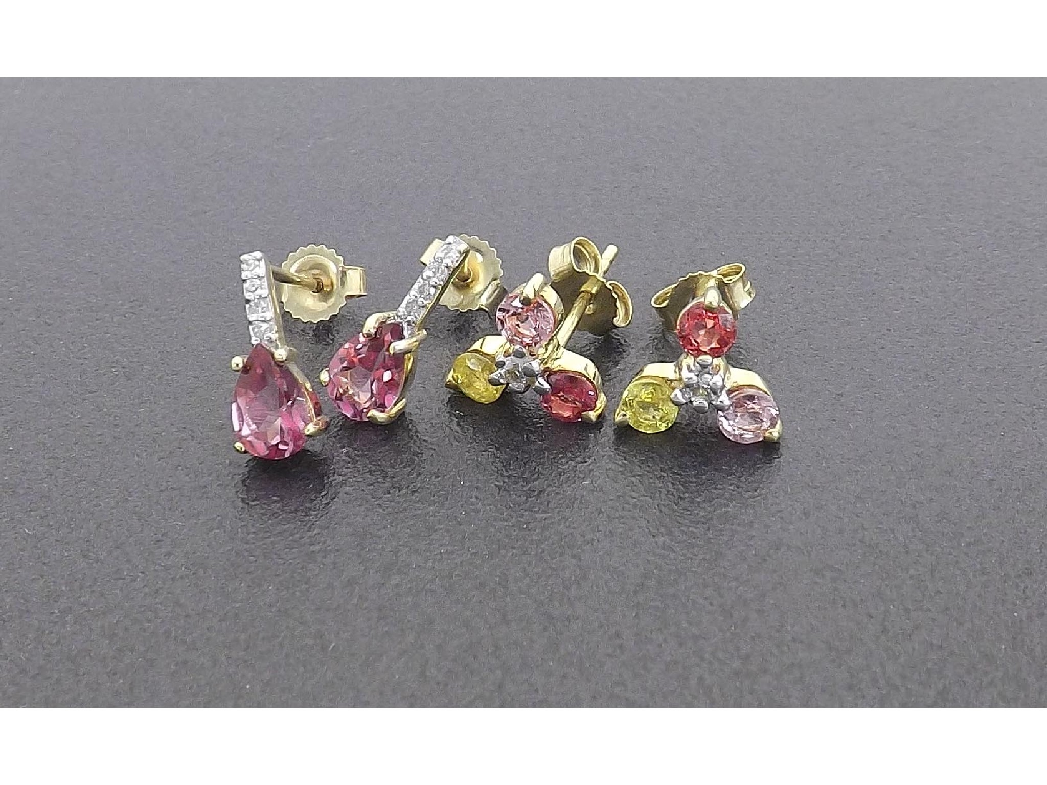 Appraisal: - -a Two pairs of diamond and coloured sapphire earrings