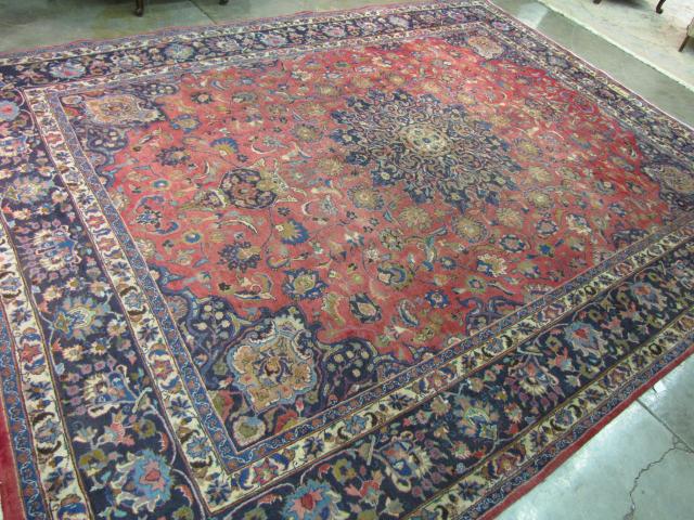 Appraisal: Semi-Antique Room Size Oriental Rug red field with medallion center