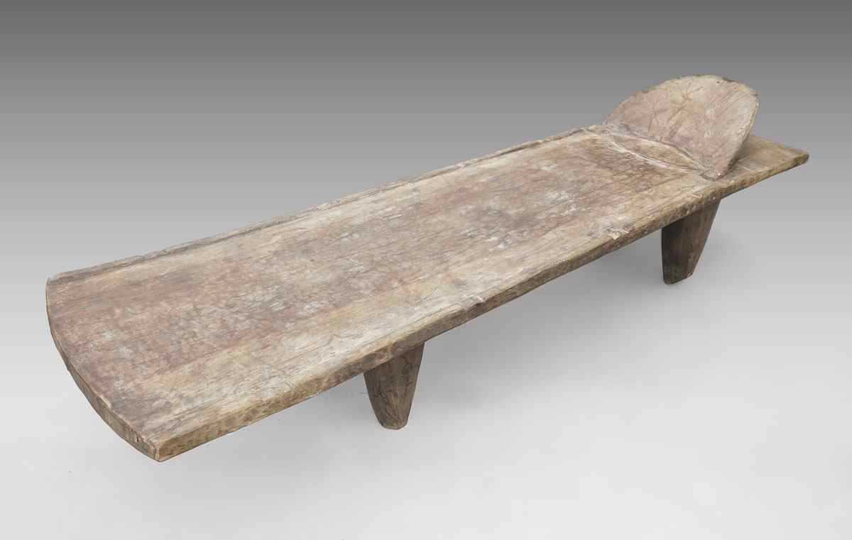 Appraisal: CARVED AFRICAN SENUFO BED ''h at top of head rest