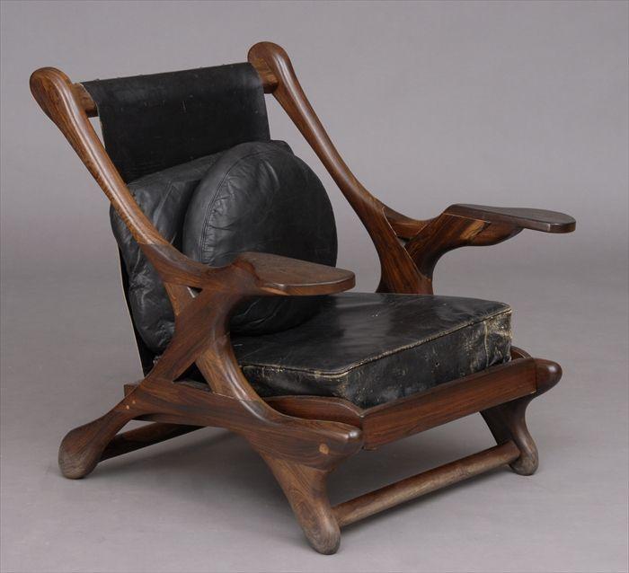 Appraisal: 'S AMERICAN STUDIO ARMCHAIR Rosewood and leather x x in